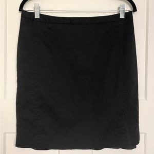 This sweet skirt has a unique set of buttons in the back.